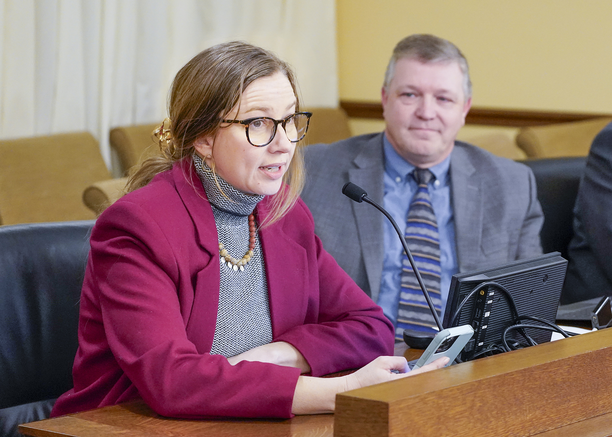 Hannah Barnhardt, who raises grass-fed beef and lamb and pastured pork, testifies with Keith Olander, executive director of the Northern Agricultural Center of Excellence, before the House agriculture committee Feb. 17. (Photo by Andrew VonBank)